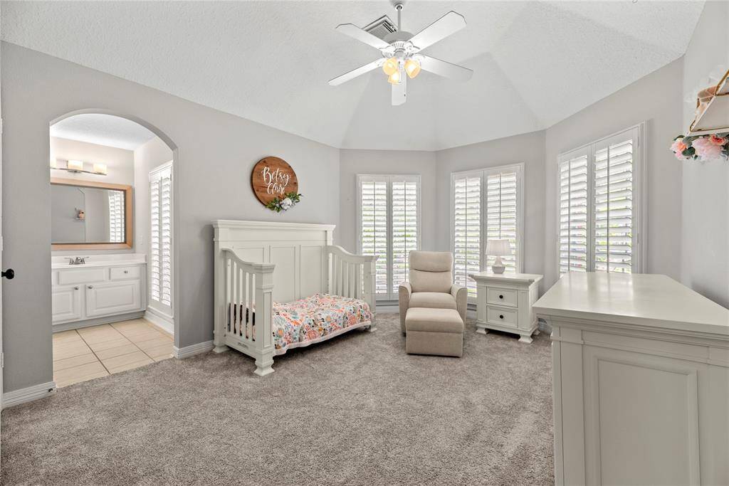Another large secondary bedroom with three large, bright, gorgeous windows!