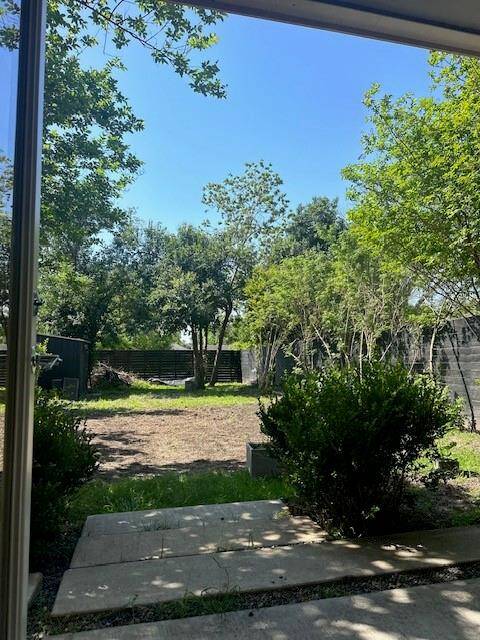 Private fenced backyard.