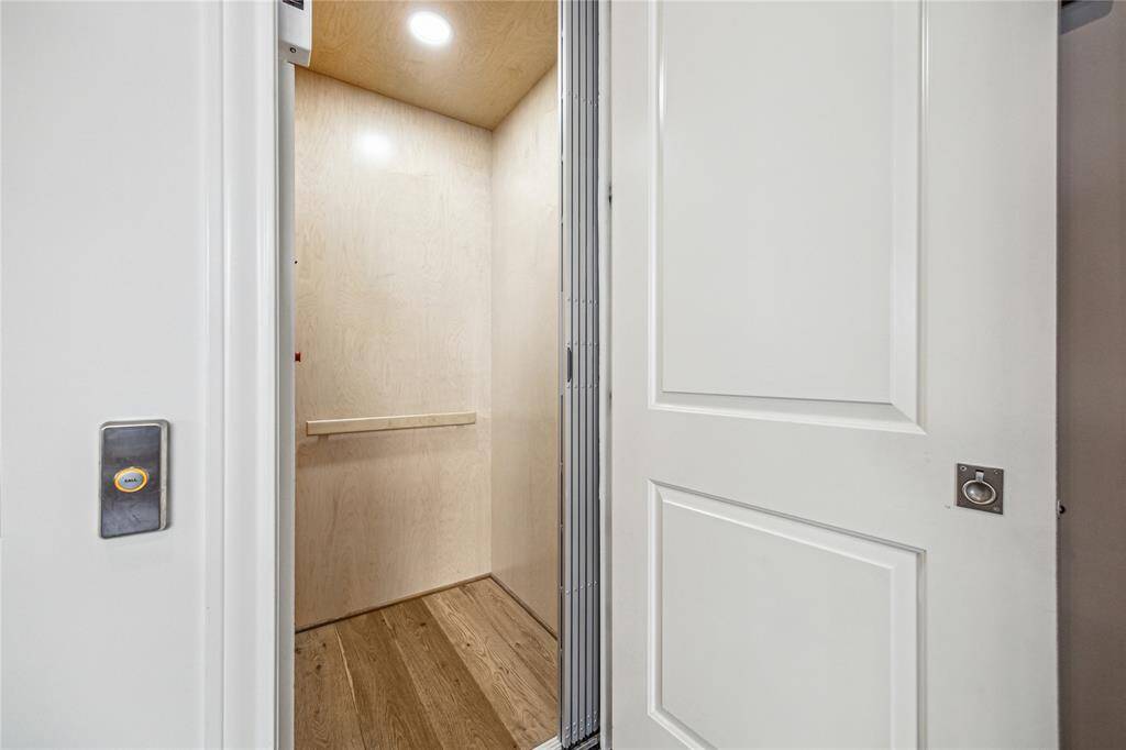 Let's go upstairs to see all of the bedrooms.  Feel free to take the elevator.
