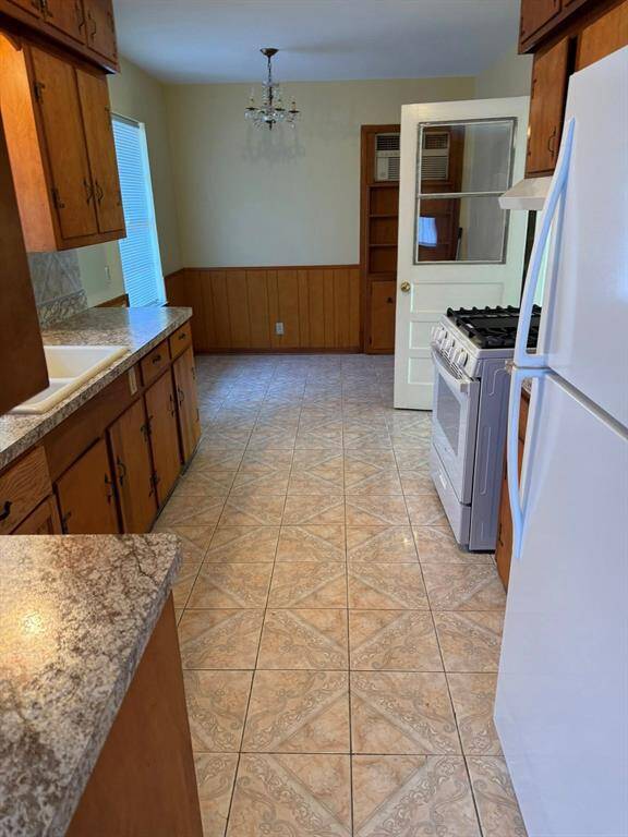 View into the kitchen from dining area.