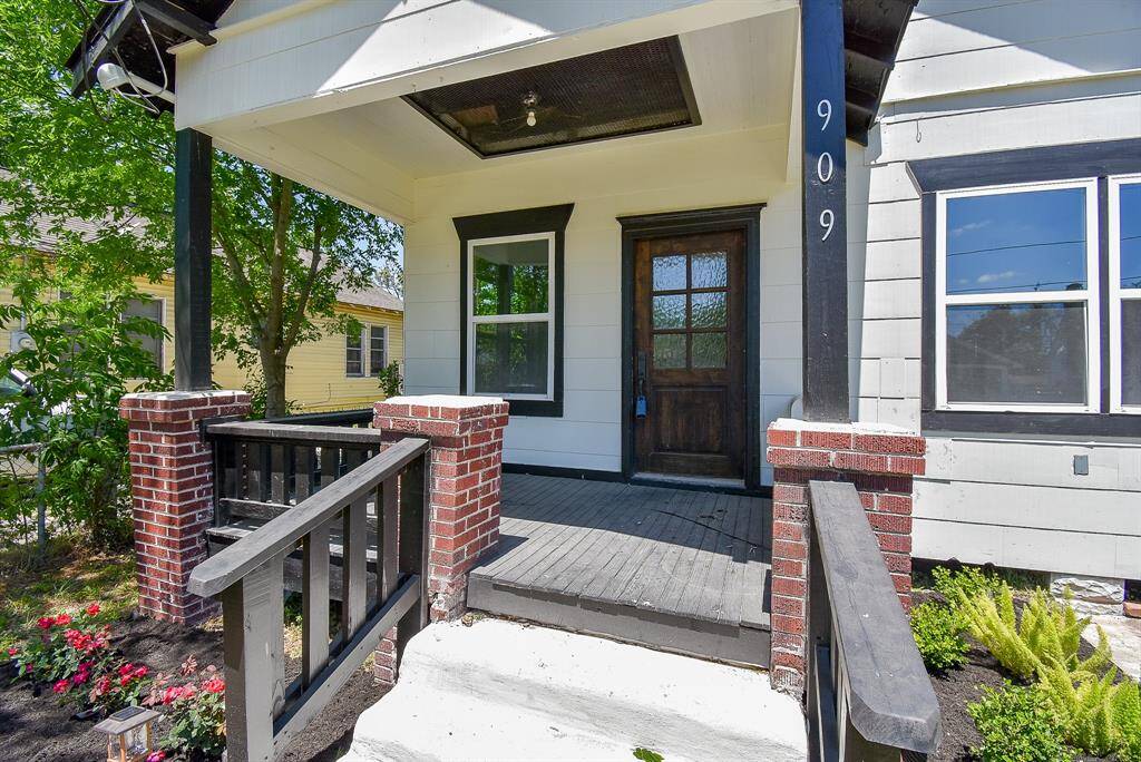 Enjoy the welcoming ambiance of a spacious front porch, perfect for savoring your morning coffee or unwinding in the evening.