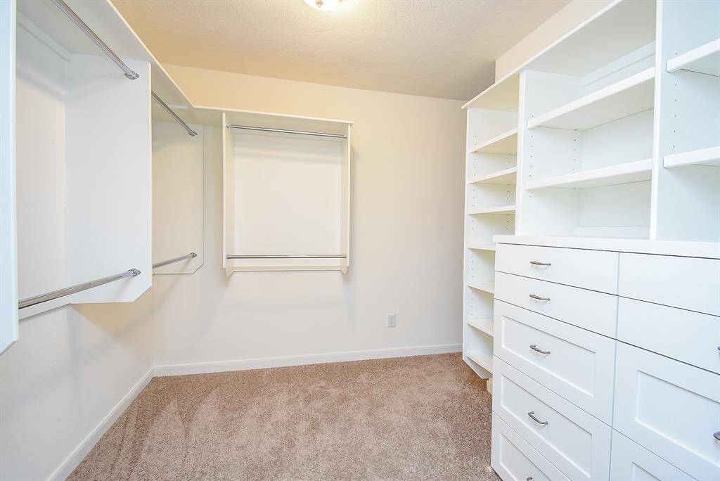 Full bath with tiled shower on 2nd floor.