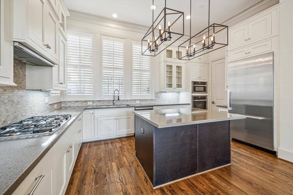 Open kitchen with ample counterspace for entertaining.