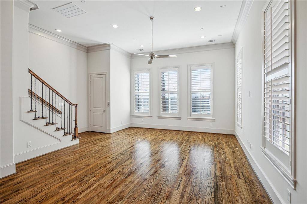 Spacious open floor plan with second floor living. Shutters throughout most of the home. Wood floors, high ceilings, gorgeous crown molding.