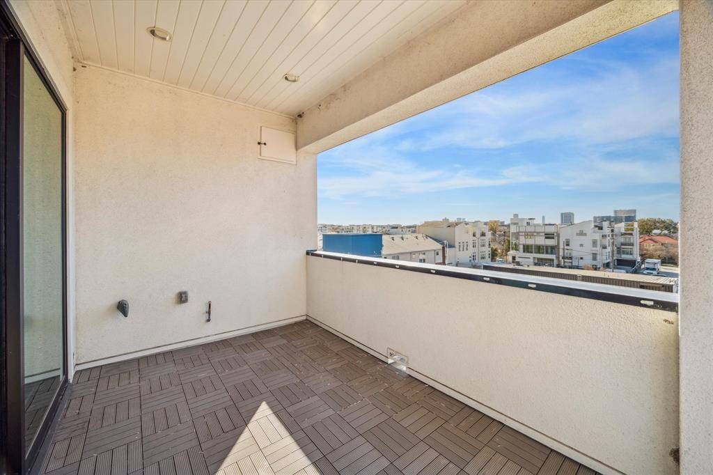 Rooftop terrace/balcony with neighborhood views and gas connection. Great for entertaining!