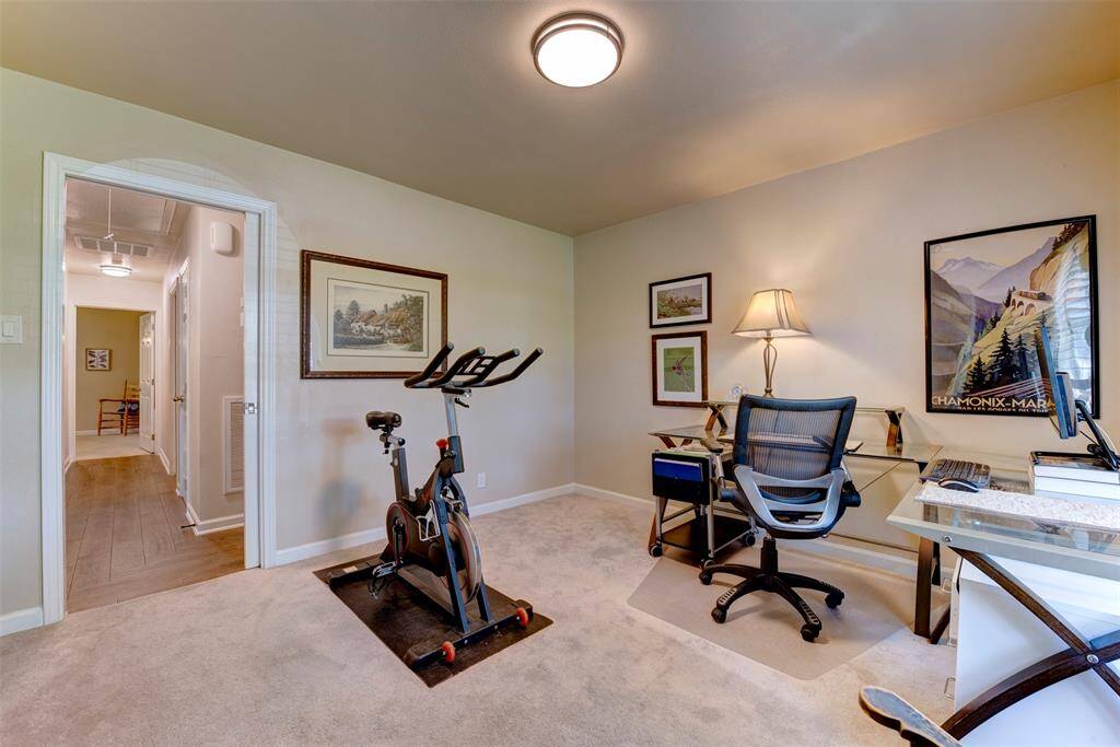 This versatile bedroom is currently being used as a workout space.
