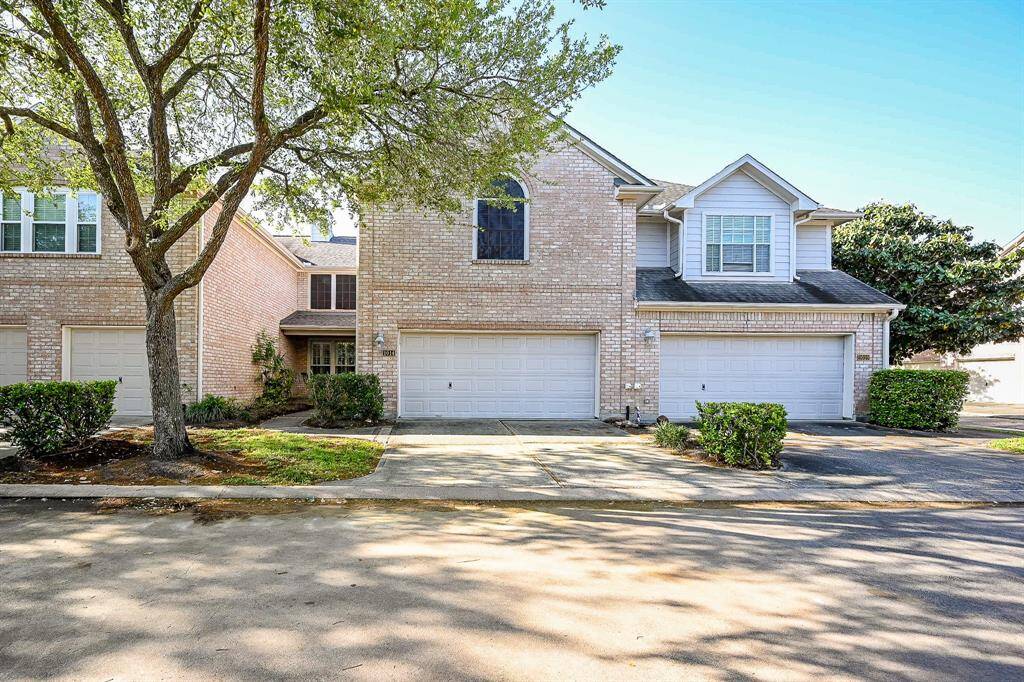 The sun is surely shining on this fabulous 2-story, brick RENTAL home, in a most desirable corner lot, at 1014 Enclave Square South, in the Park on Enclave gated community.
