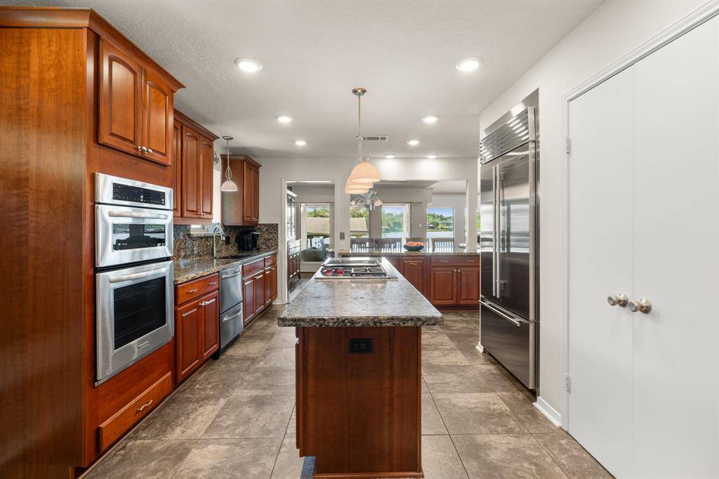 You will notice this kitchen has plenty of storage and countertop space.