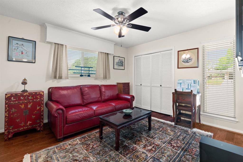 Secondary bedroom currently used as a TV room.+