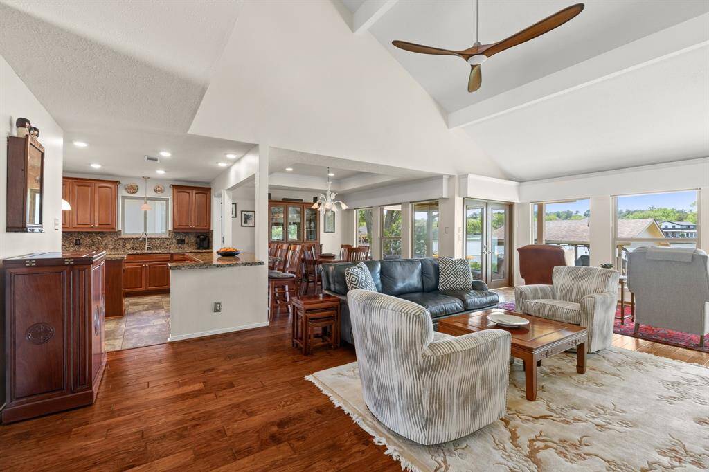 Your view into the heart of the home. Beautiful wood floors throughout the home with tile flooring in the kitchen.