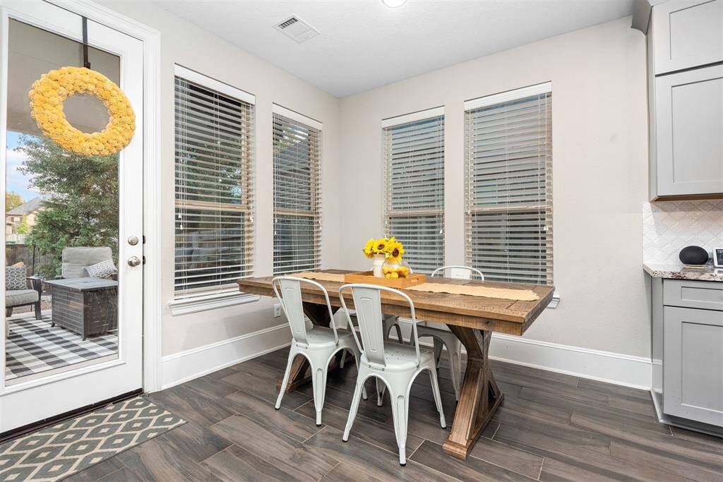 Separate breakfast area looks out to backyard.