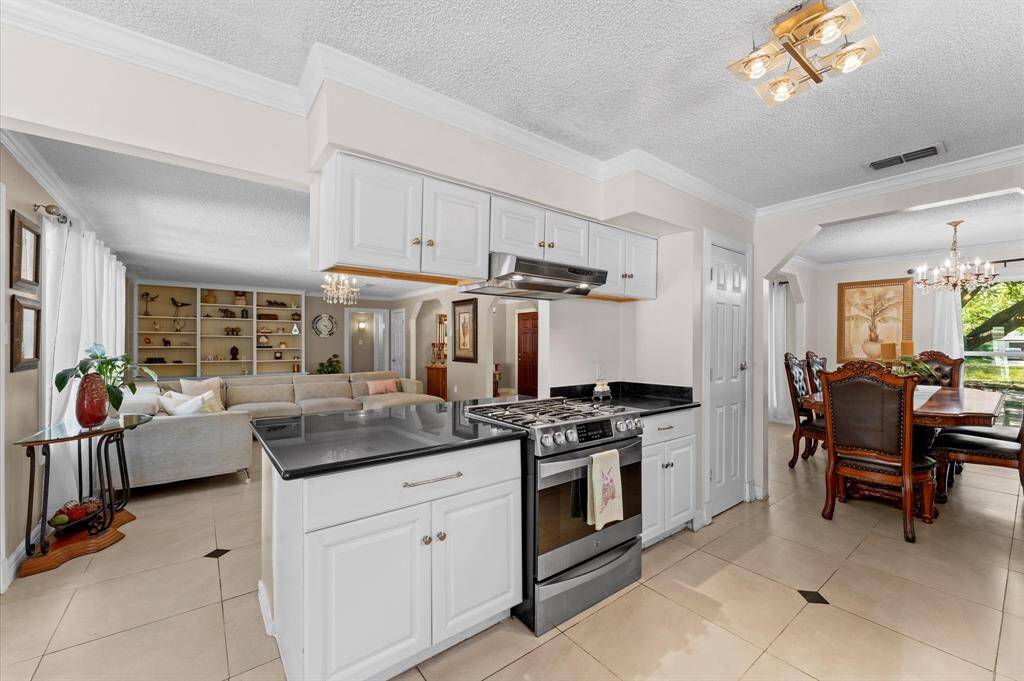 Gather together in good conversation while preparing a fabulous meal in this beautiful kitchen!
