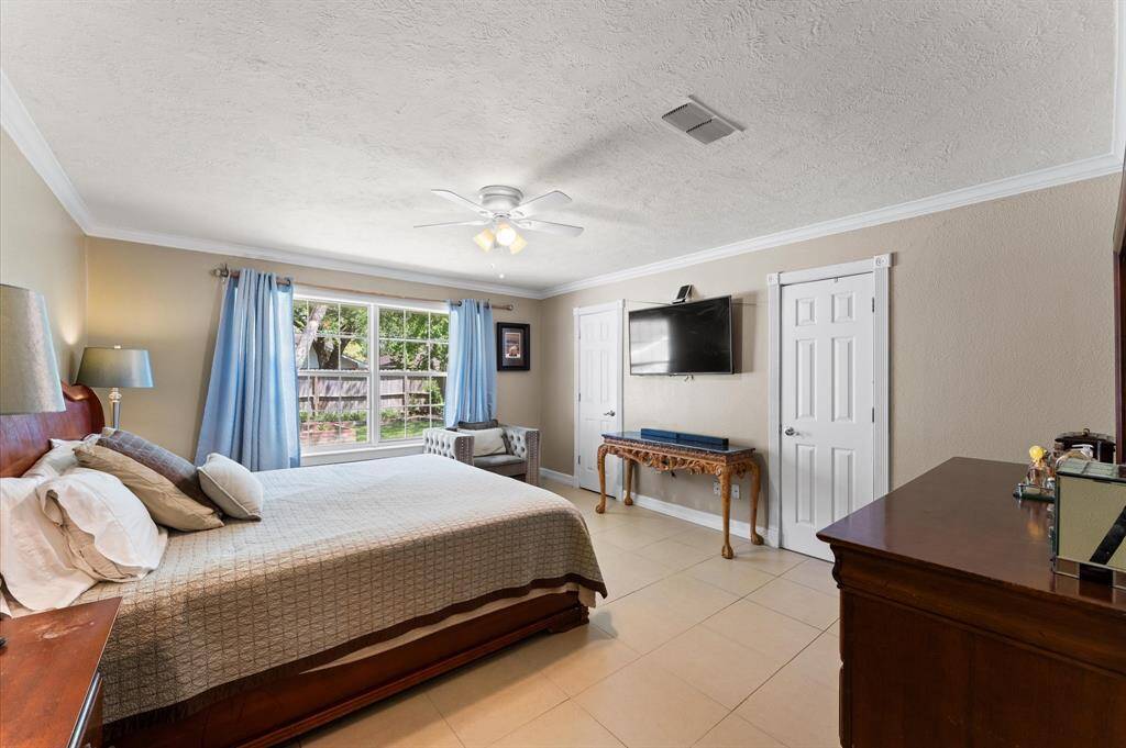 Primary bedroom that can accommodate a king size bed and plenty of room for night stands.
