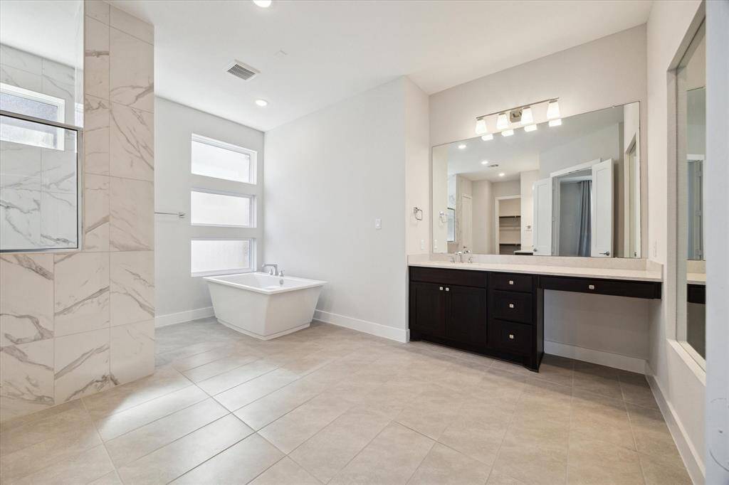 FIRST FLOOR - PRIMARY SUITE EXPANSIVE and lux bathroom