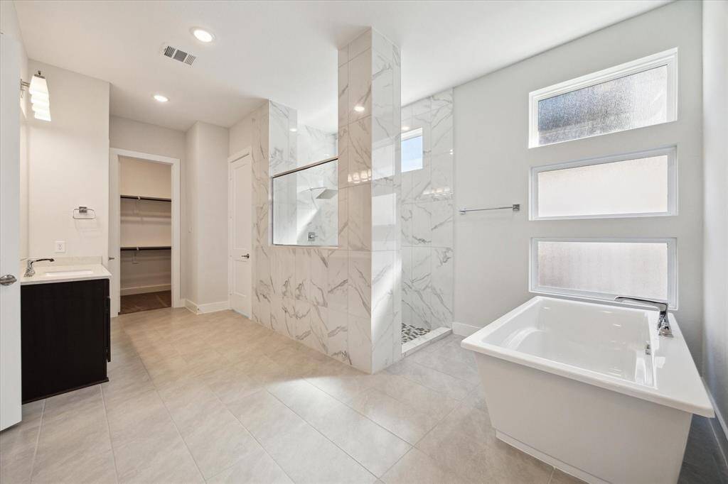 FIRST FLOOR - PRIMARY SUITE EXPANSIVE and lux bathroom