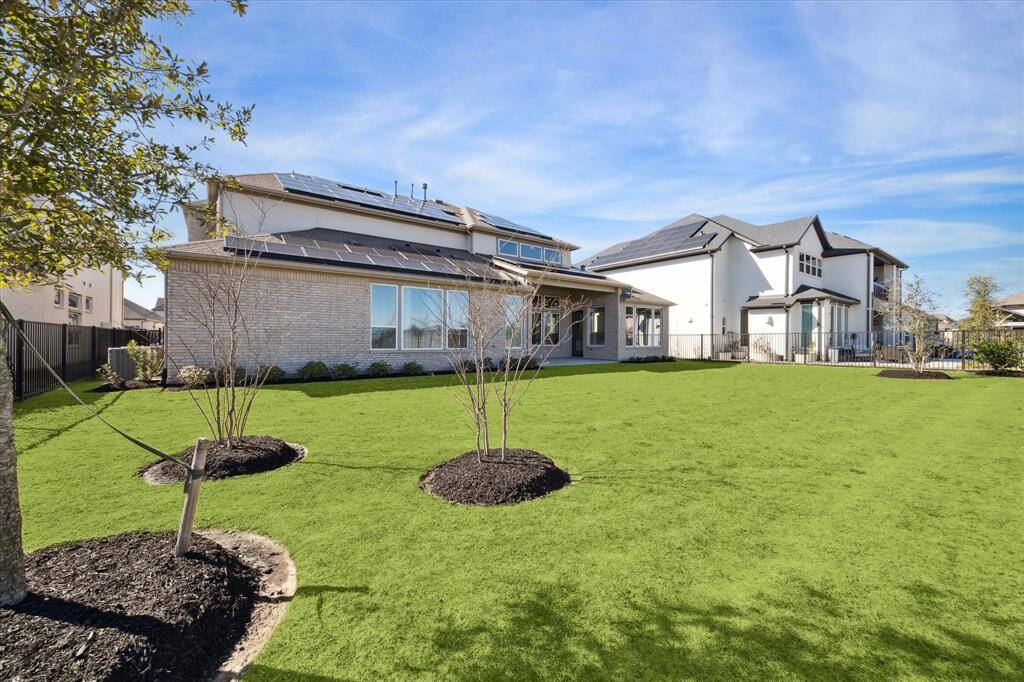 Look at this expansive covered patio and stunning view!  NO BACK NEIGHBORS!