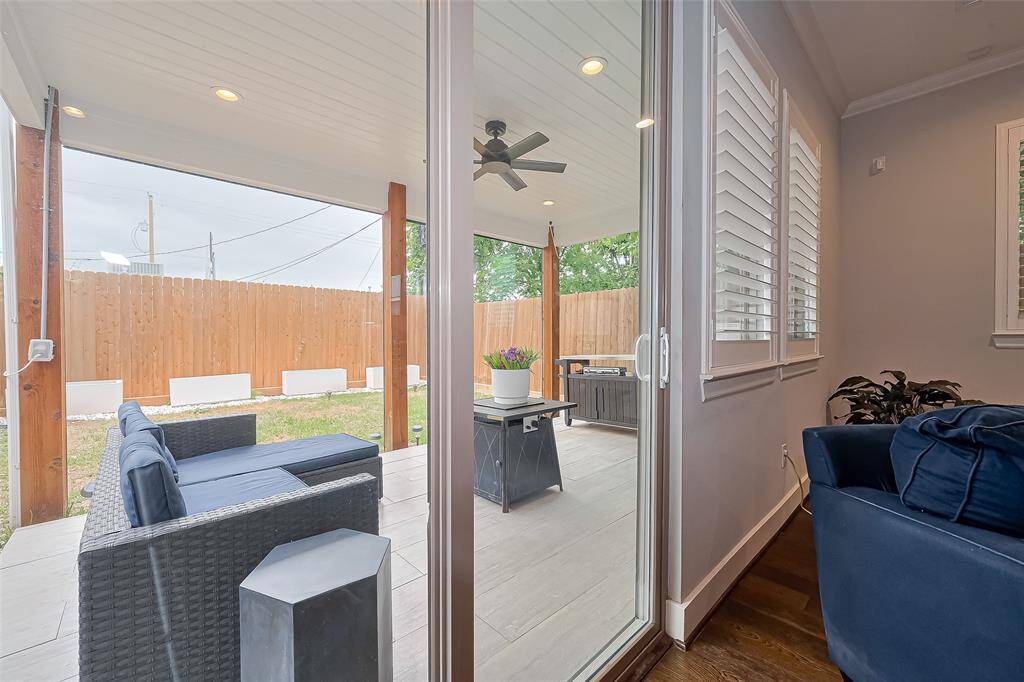 The covered patio was an add on which features tile floors, recessed lights, ceiling fan and electric solar screens.
