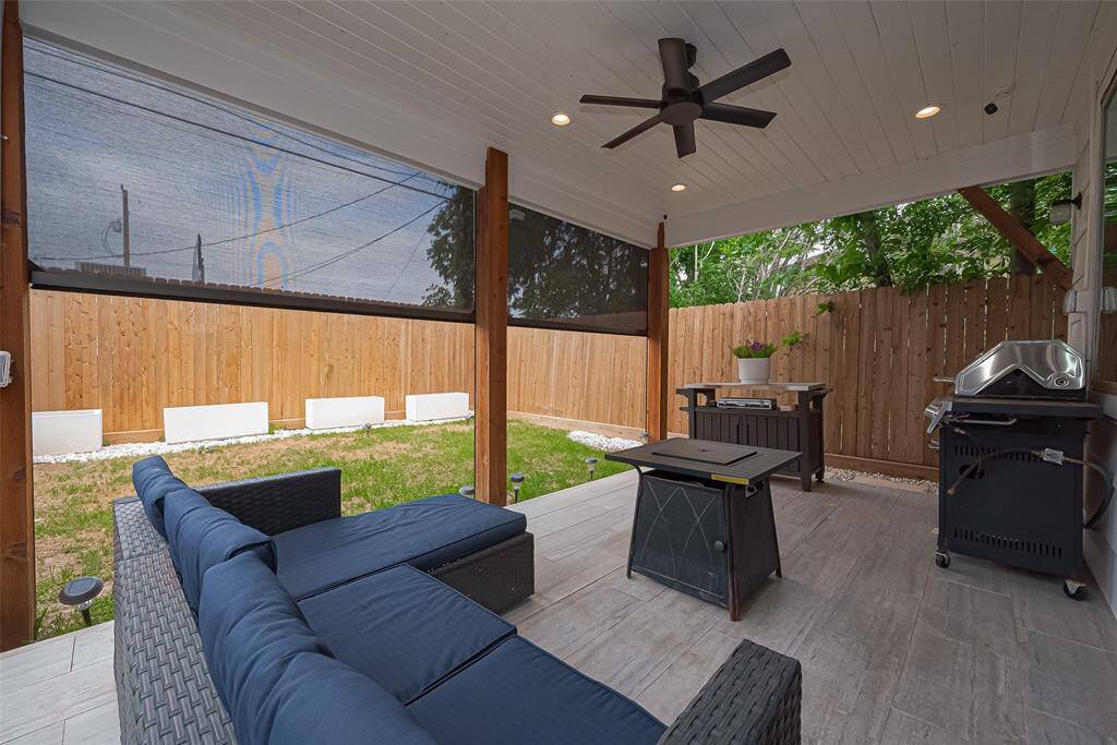 Covered patio with additional yard space for pets or gardening.