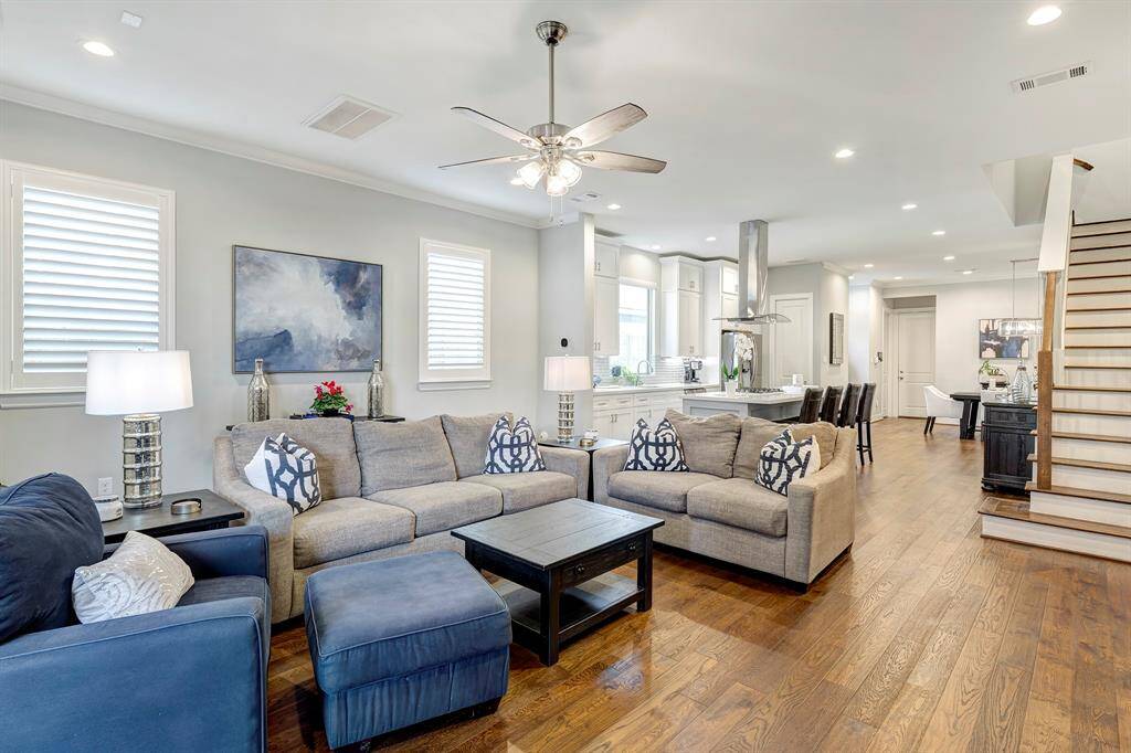 Open floor plan, high ceilings, engineered hardwood floors, plantations shutters and crown moldings.