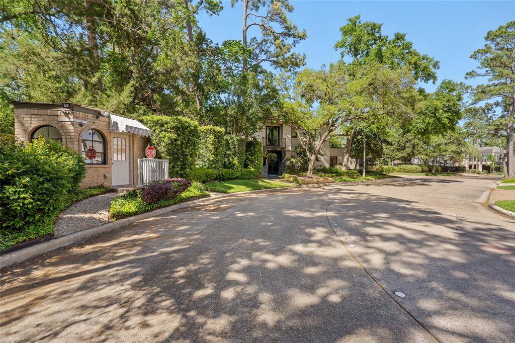 Entrance to subdivision with guard.