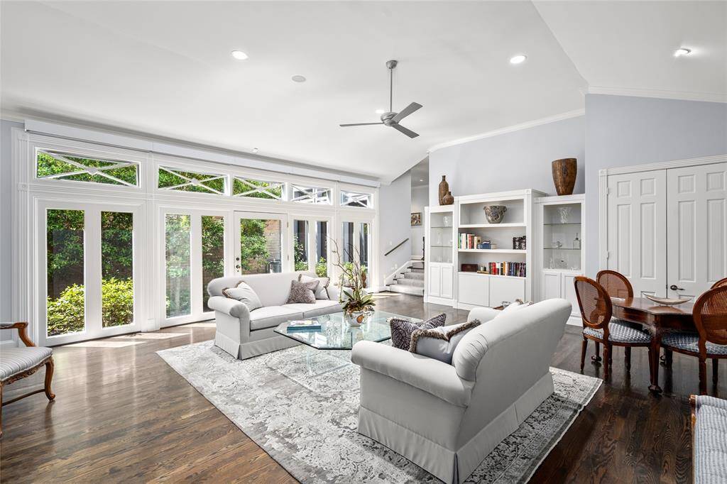 Living room also overlooks the atrium. Windows all have motorized solar shades.