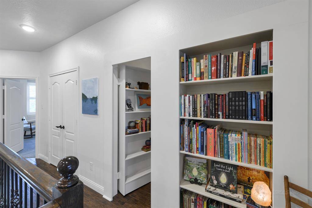 This is just ONE of the hidden doorways in this home! There are multiple hidden doorways in the home behind the bookcases, which are fun hiding nooks, or additional storage space.
