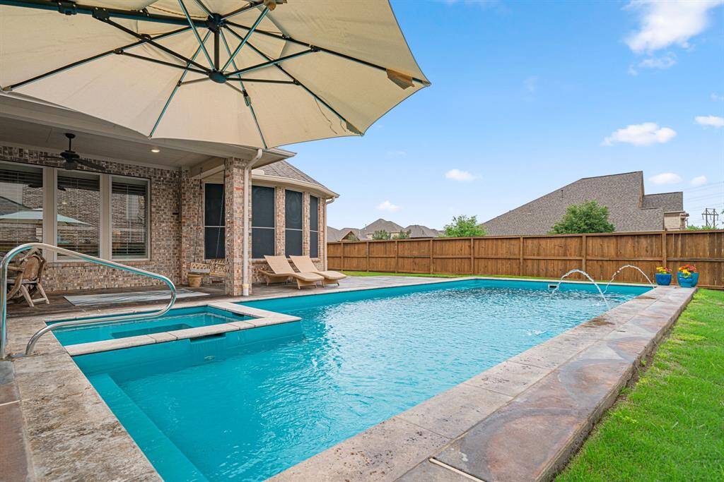 This large corner lot provides the added benefit of no side neighbors.