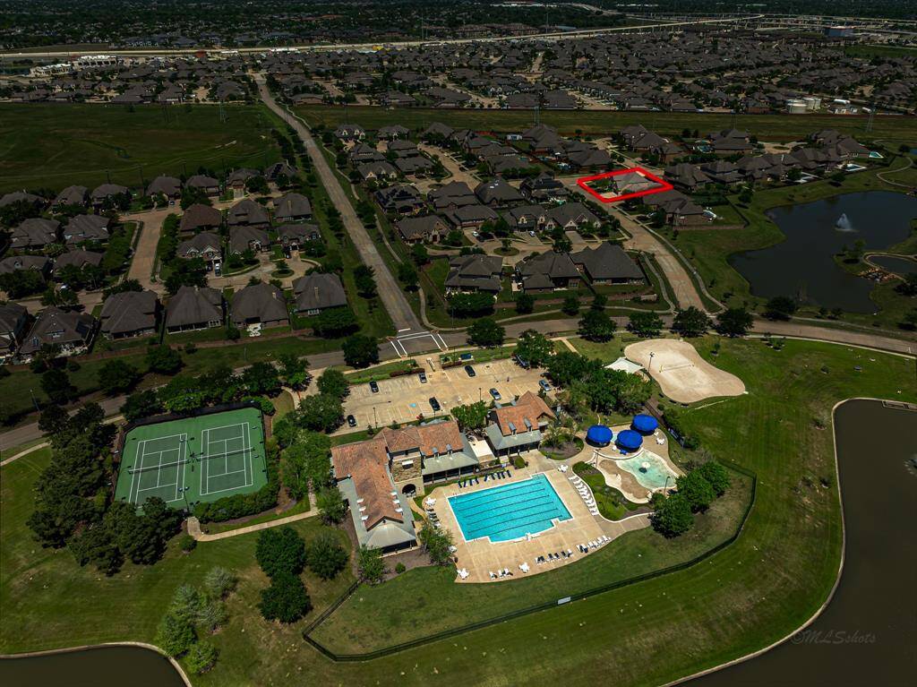 Amenities from left to right, tennis courts, fitness center, clubhouse, pool, splash pad, playground (under the trees), and sand volleyball courts. All just minutes from your doorstep!