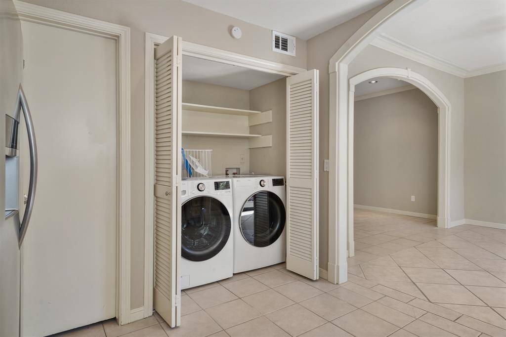 Right off the kitchen is the laundry area with brand new washer/dryer and storage space. Washer and Dryer will convey with the property.