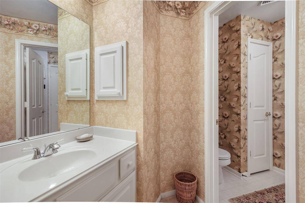 View of the other side of the hollywood bathroom located upstairs.