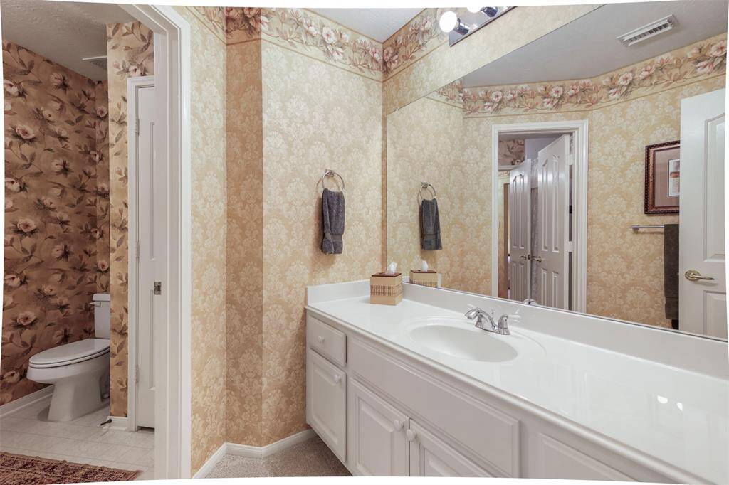 View of one half of the hollywood bathroom located upstairs.