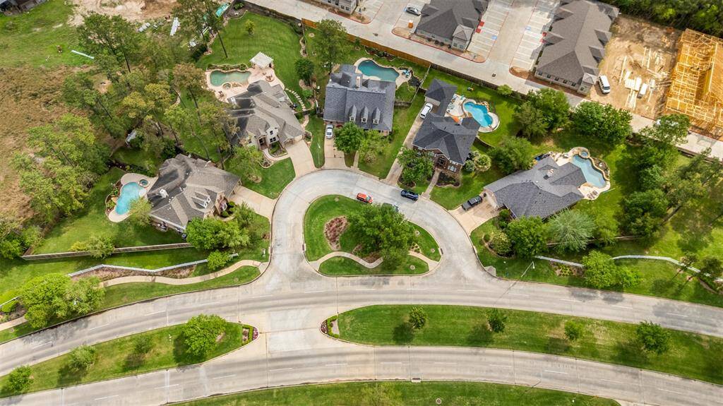 Aerial showing this great home on a cul-de-sac circle. The property is the second one on your left.