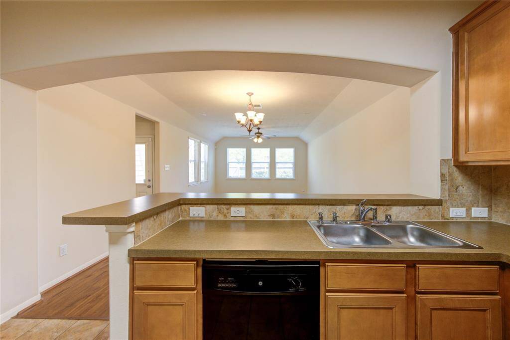 Kitchen Facing Bar overlooking Family Room