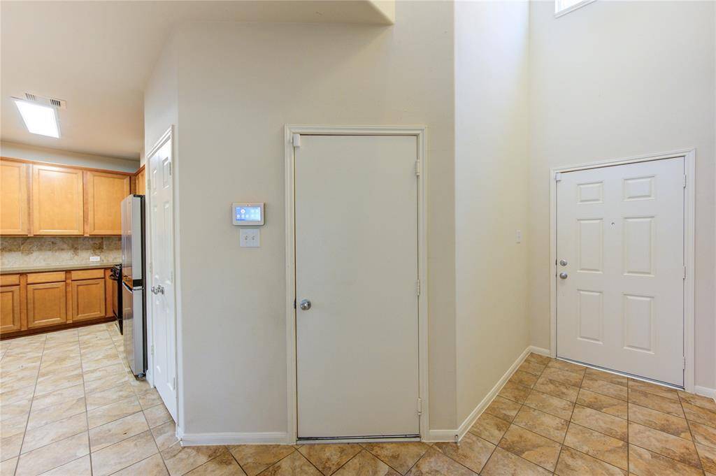 Entrance Hall by Kithen Facing Garage Door