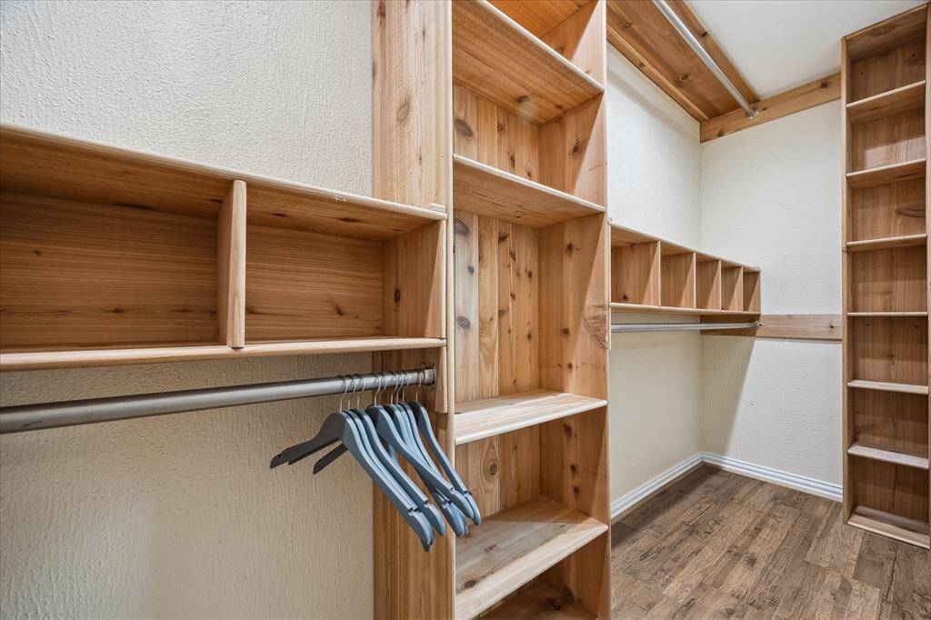 Custom built shelving / cabinetry in the primary closets