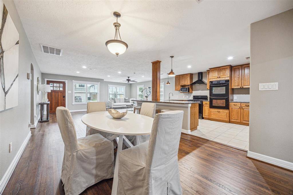 Dining sits right off the kitchen for ease of entertaining.