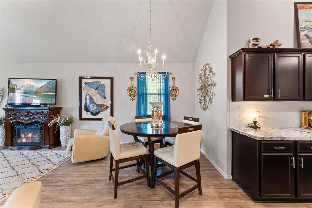 Nestled between the kitchen and the living room, the breakfast area offers a cozy and inviting spot to enjoy meals