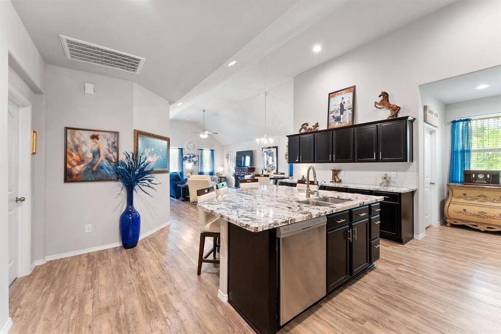Step through the entrance into a welcoming kitchen that overlooks the spacious living room