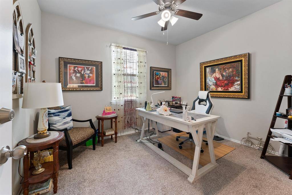 This secondary bedroom offers a flexible space that can effortlessly transform into a comfortable home office