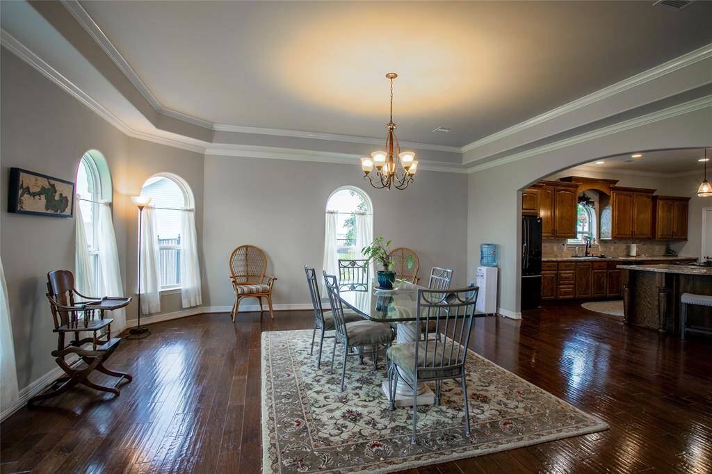 Floor-to-ceiling windows overlooking the lake