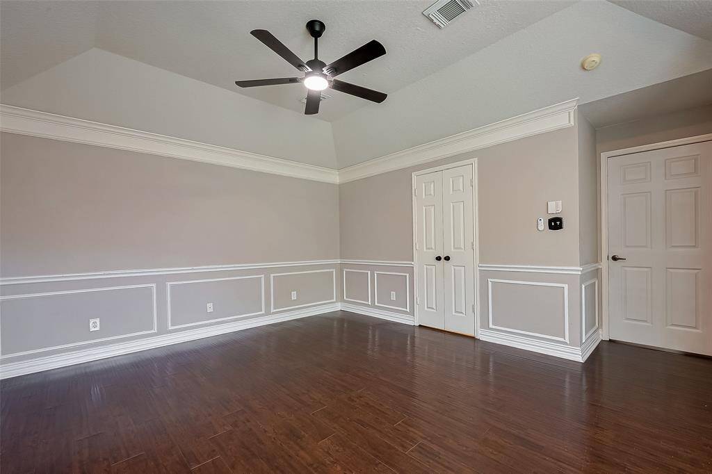 Another view of the primary bedroom