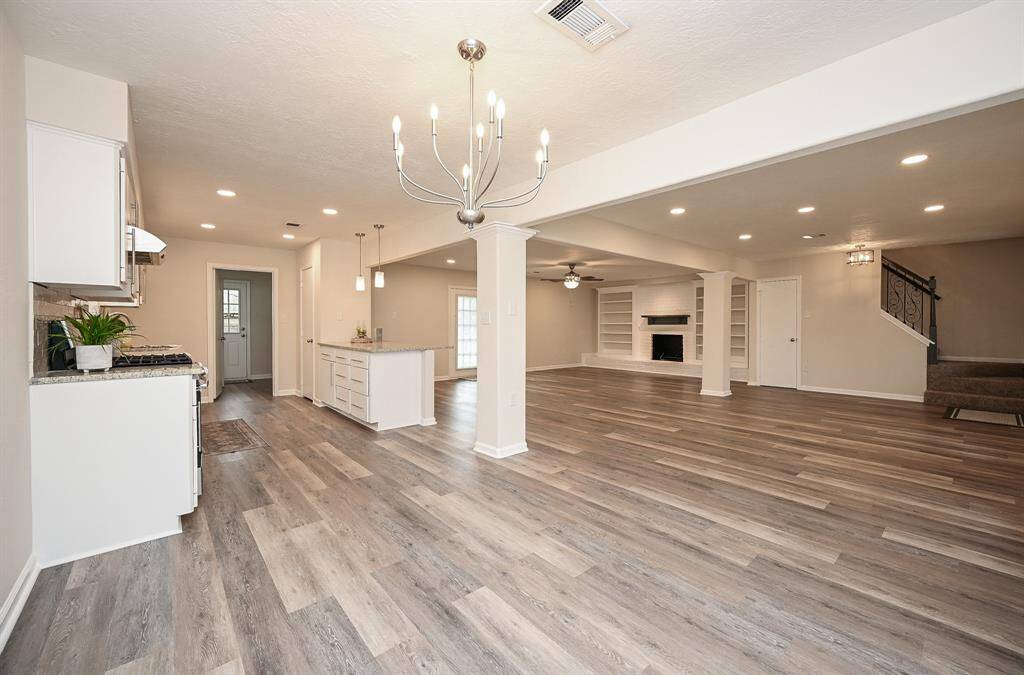 Kitchen and breakfast areas are open to the massive family room space