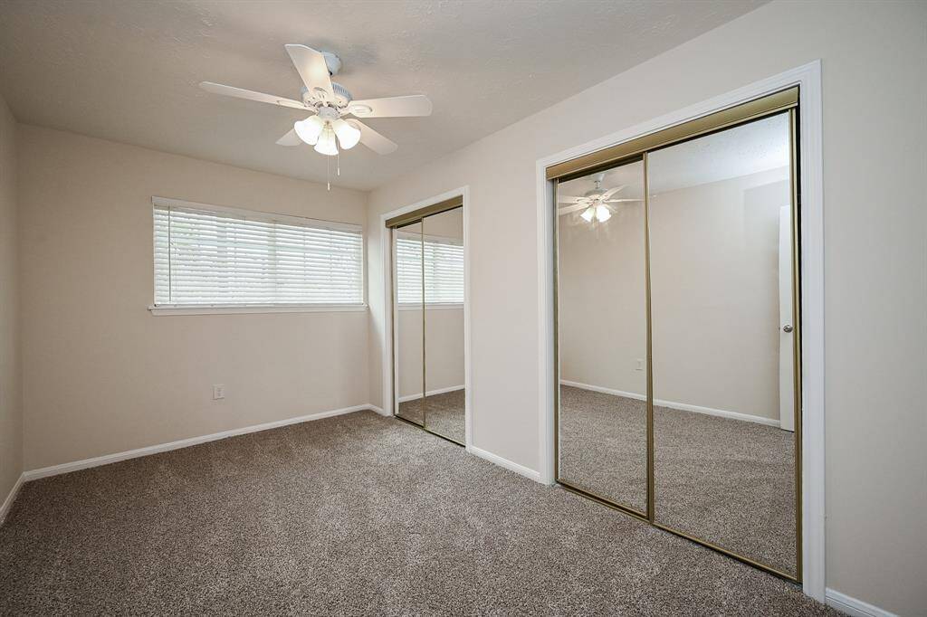 Bedroom:  All 4 bedrooms have new carpet, window blinds, and ceiling fans!