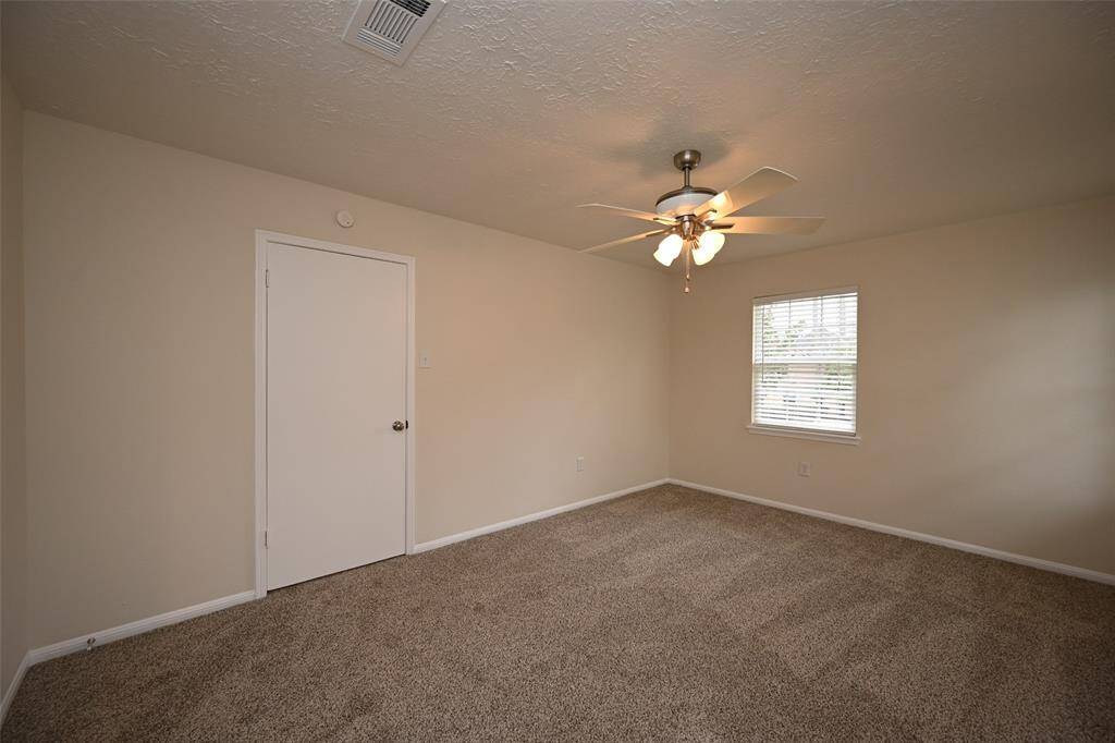 Bedroom:  All 4 bedrooms have new carpet, window blinds, and ceiling fans!