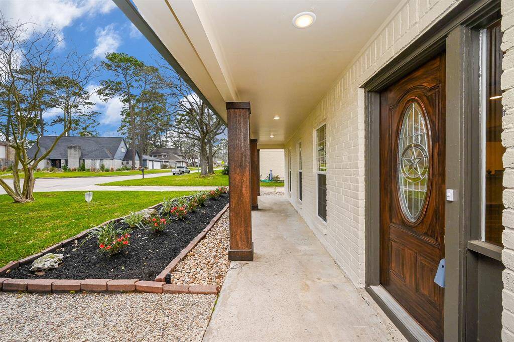 Custom built 12x12 columns in front, recessed LED lighting, and a new front door! makes this area so nice