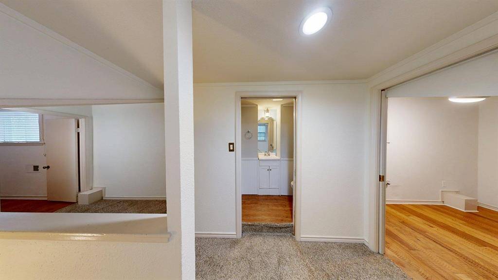 As you come from the stairs, you have one bedroom to the left and the other to the right with the bathroom at the center