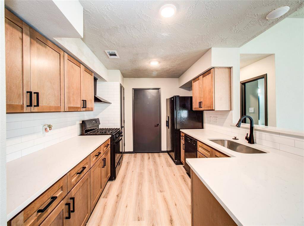 Kitchen leading to laundry room