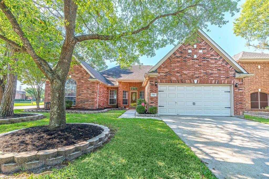 Charming one story home with lake view in golf course community of Canyon Lakes at Stonegate.
