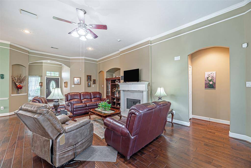 This room also has built in nook and wood burning fireplace with tile surround and mantle.