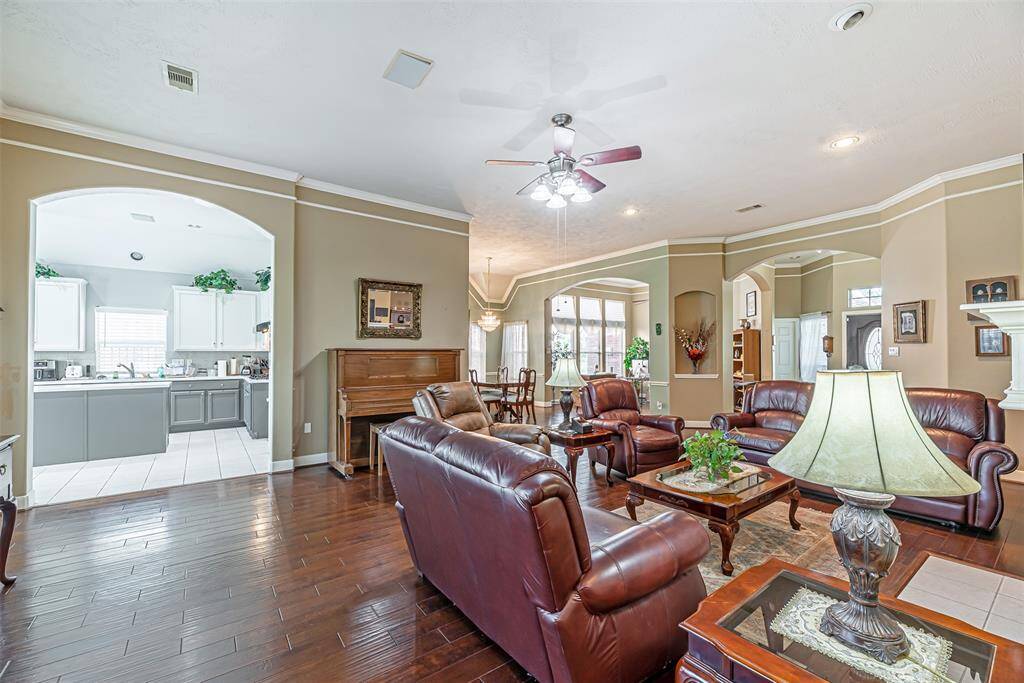 The kitchen is open to the family room with the expanded arched doorway.